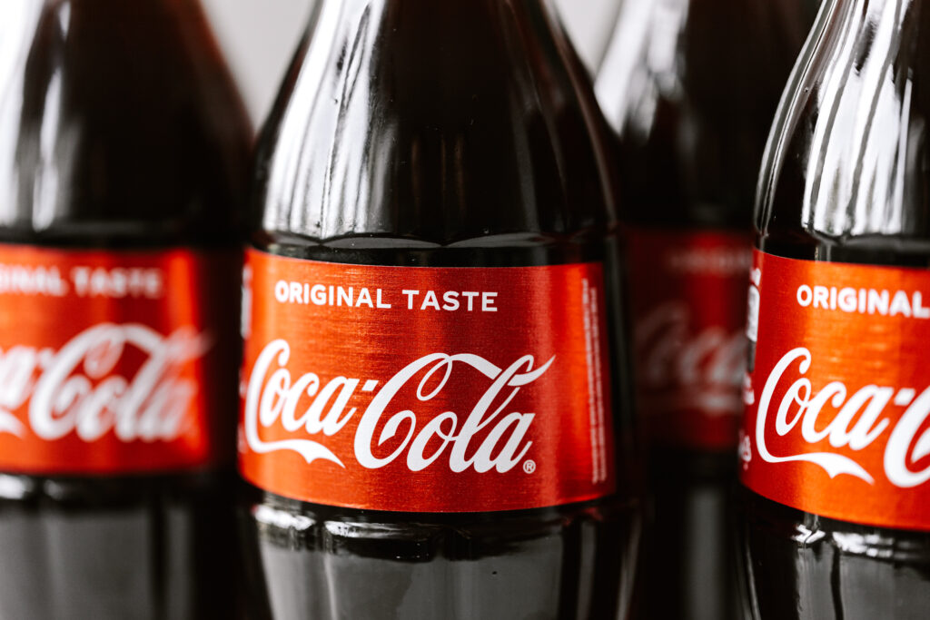 Close up of Coca Cola glass bottles.