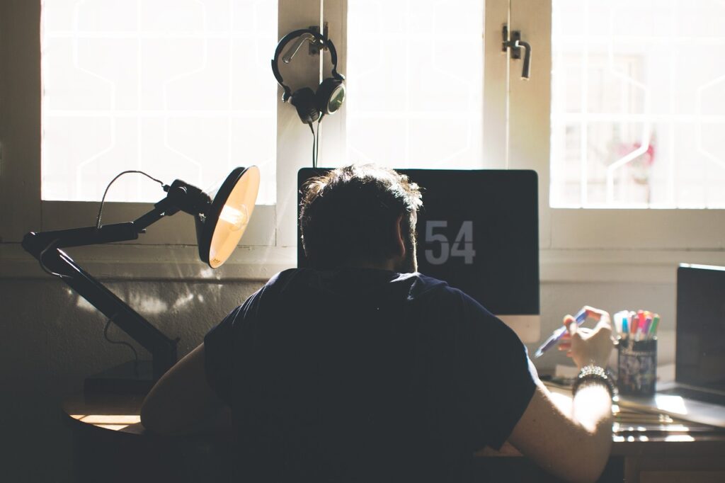 A man at a computer