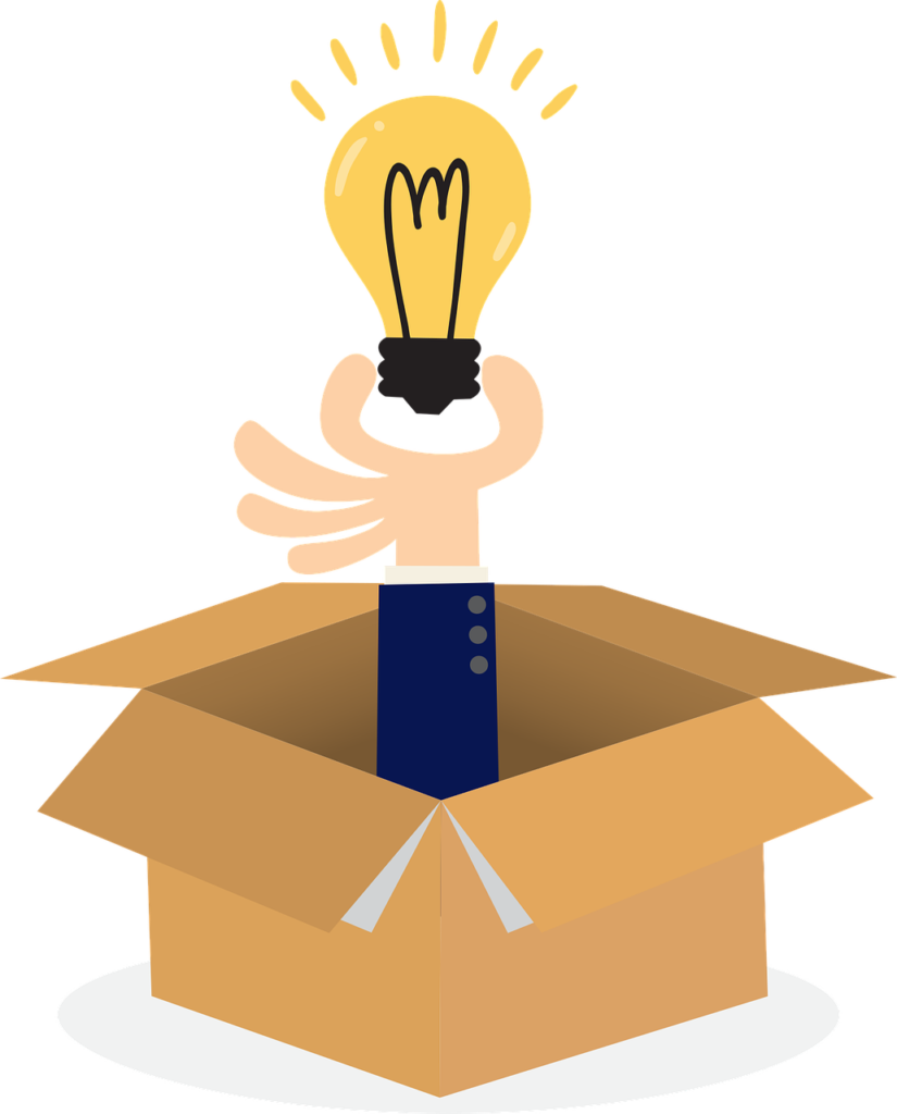 A cardboard box with a hand coming out holding a light bulb to display the hand figured out how to decide which business to start.