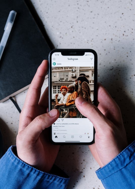 Person checking an Instagram post.